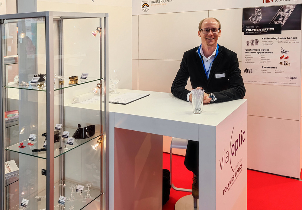 Viaoptic als Aussteller auf der Laser Messe in München. World of Photonics, Kunststoffoptiken, Sensoroptiken.